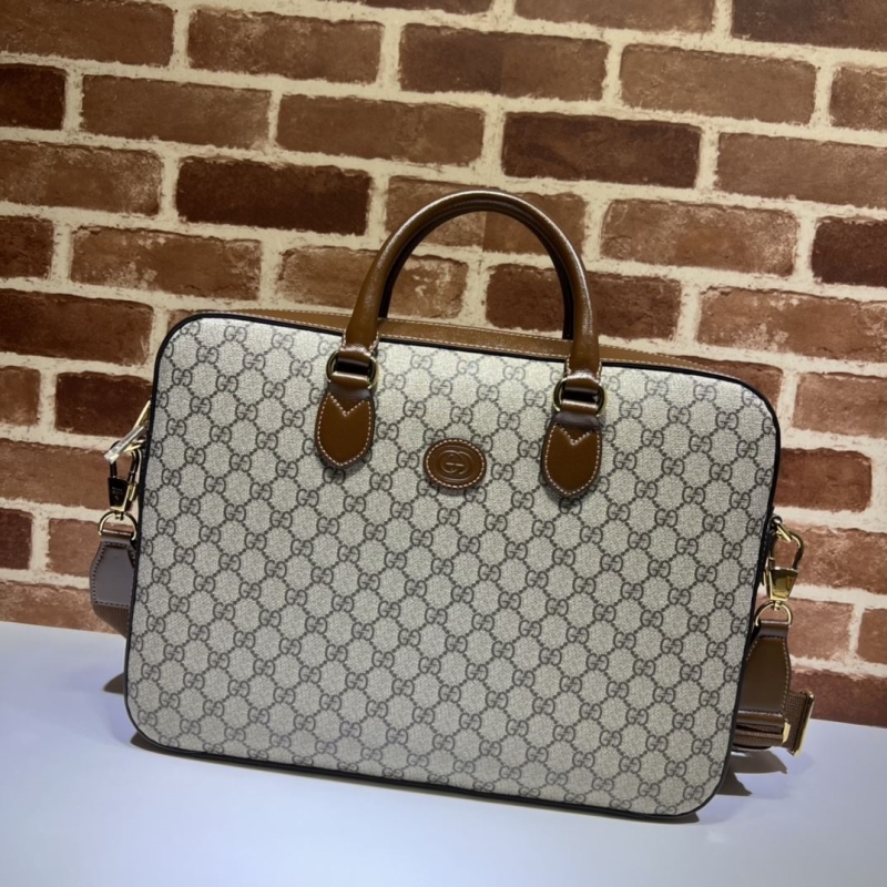 G*u*i top handle bags